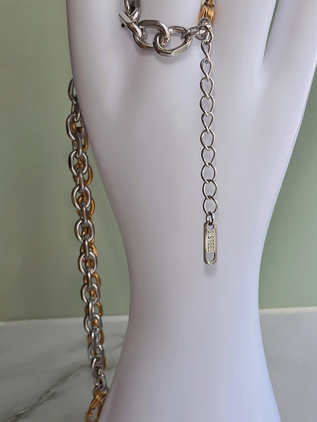 Modern non tarnish safety pin jewelry set with gold and silver finishes.