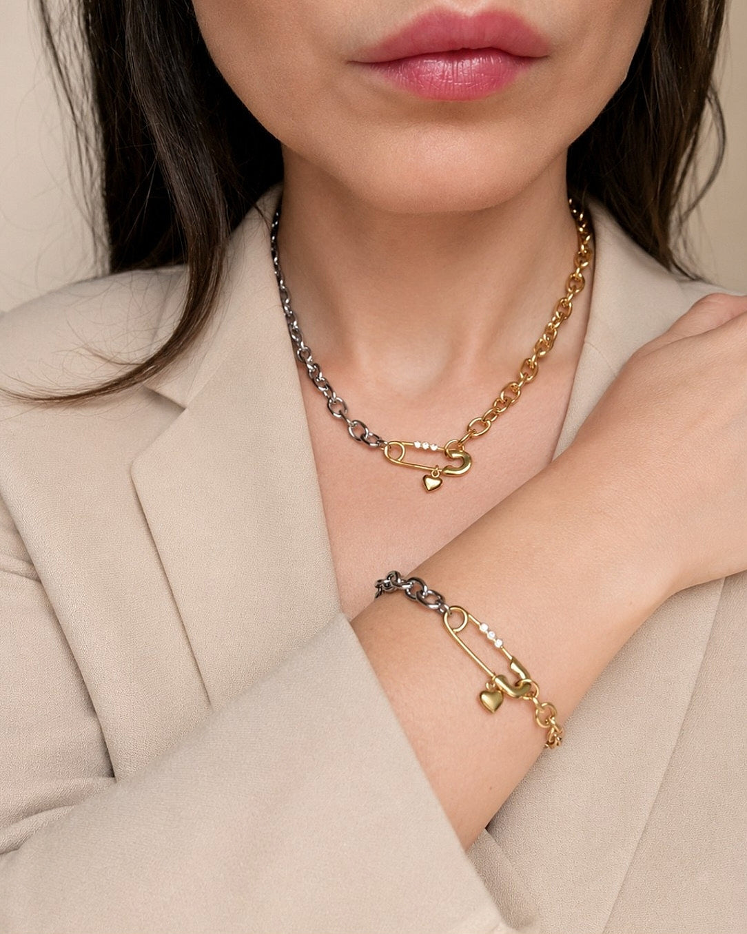 Non tarnish safety pin necklace and bracelet set in mixed metal two-tone stainless steel.