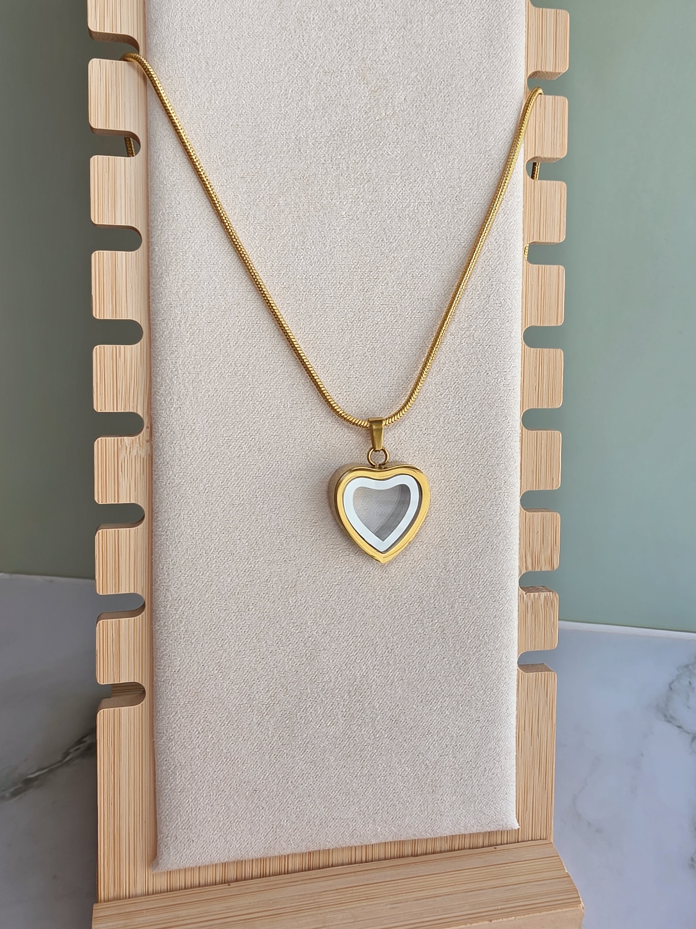 Heart urn pendant for ashes with a timeless design.