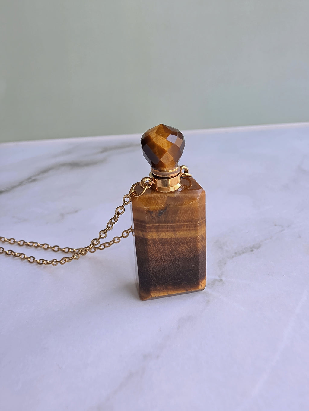 Tiger's Eye crystal perfume bottle pendant necklace.