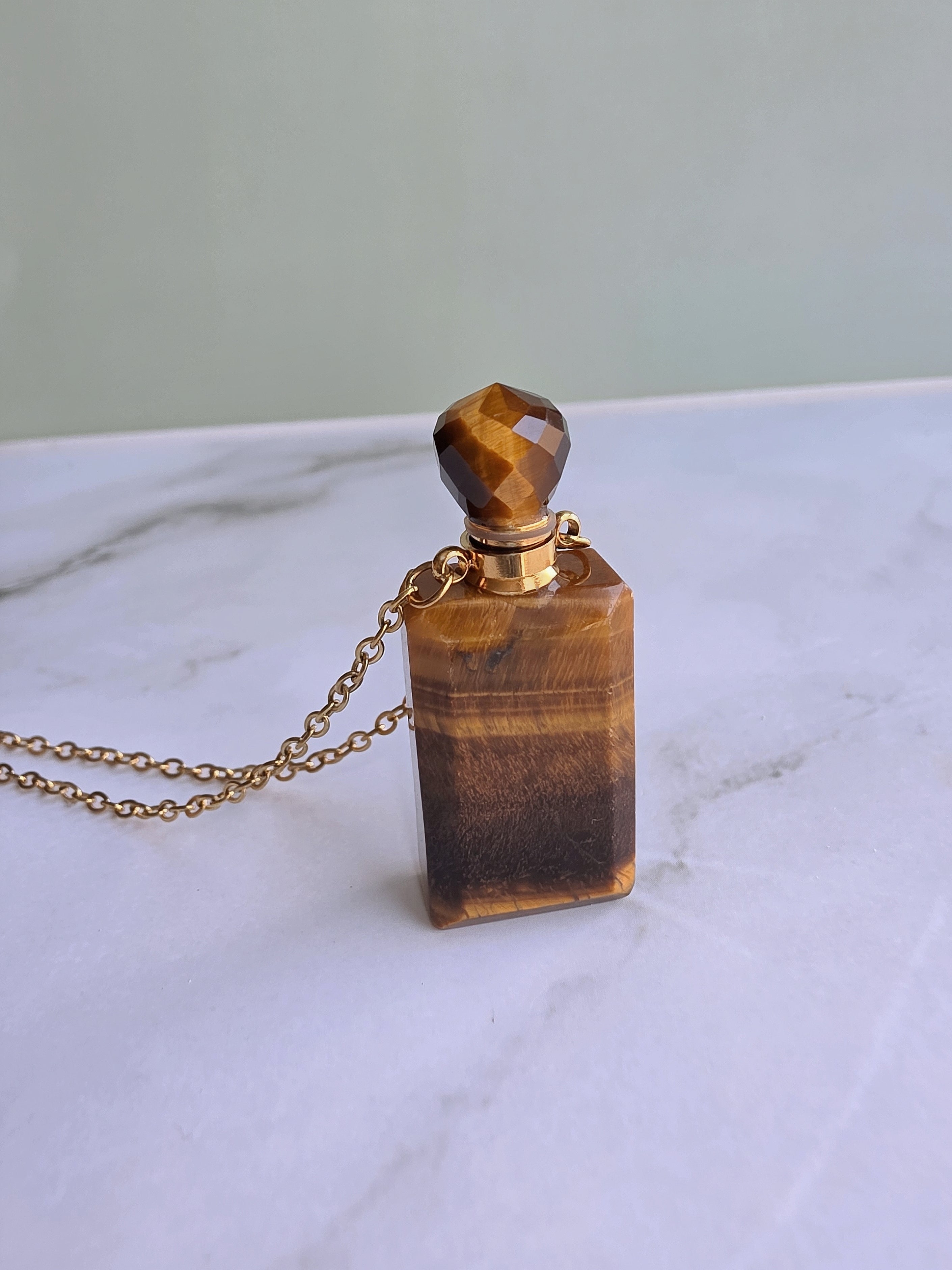 Tiger's Eye crystal perfume bottle pendant necklace.