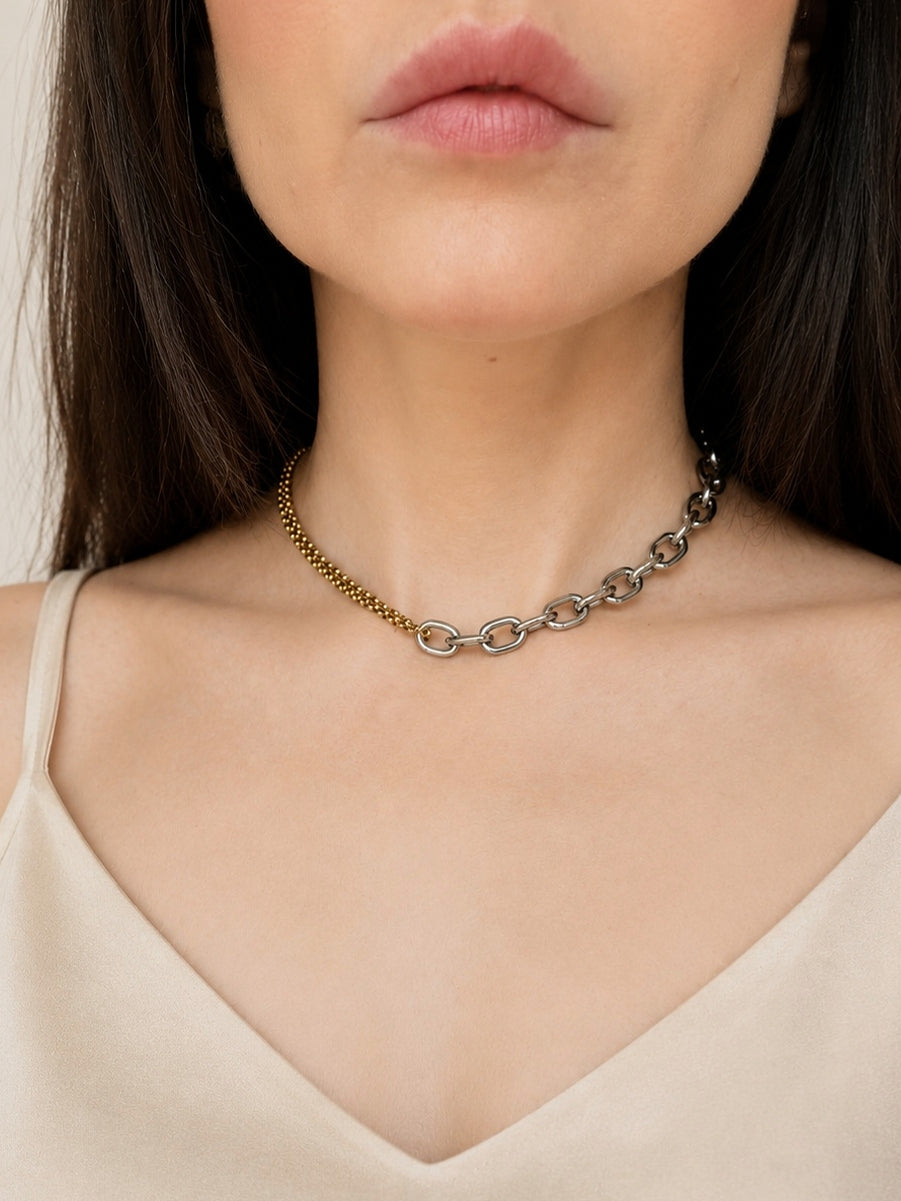 Minimalist mixed metal choker necklace for everyday wear.