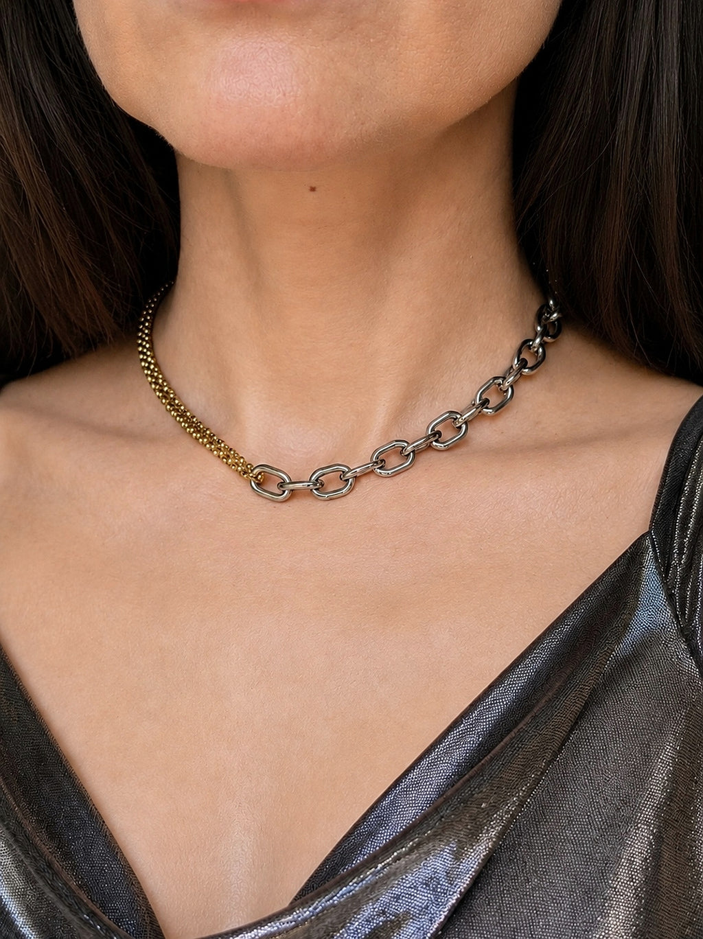 Mixed metal necklace with a two-tone chain and 18K gold-plated finish.