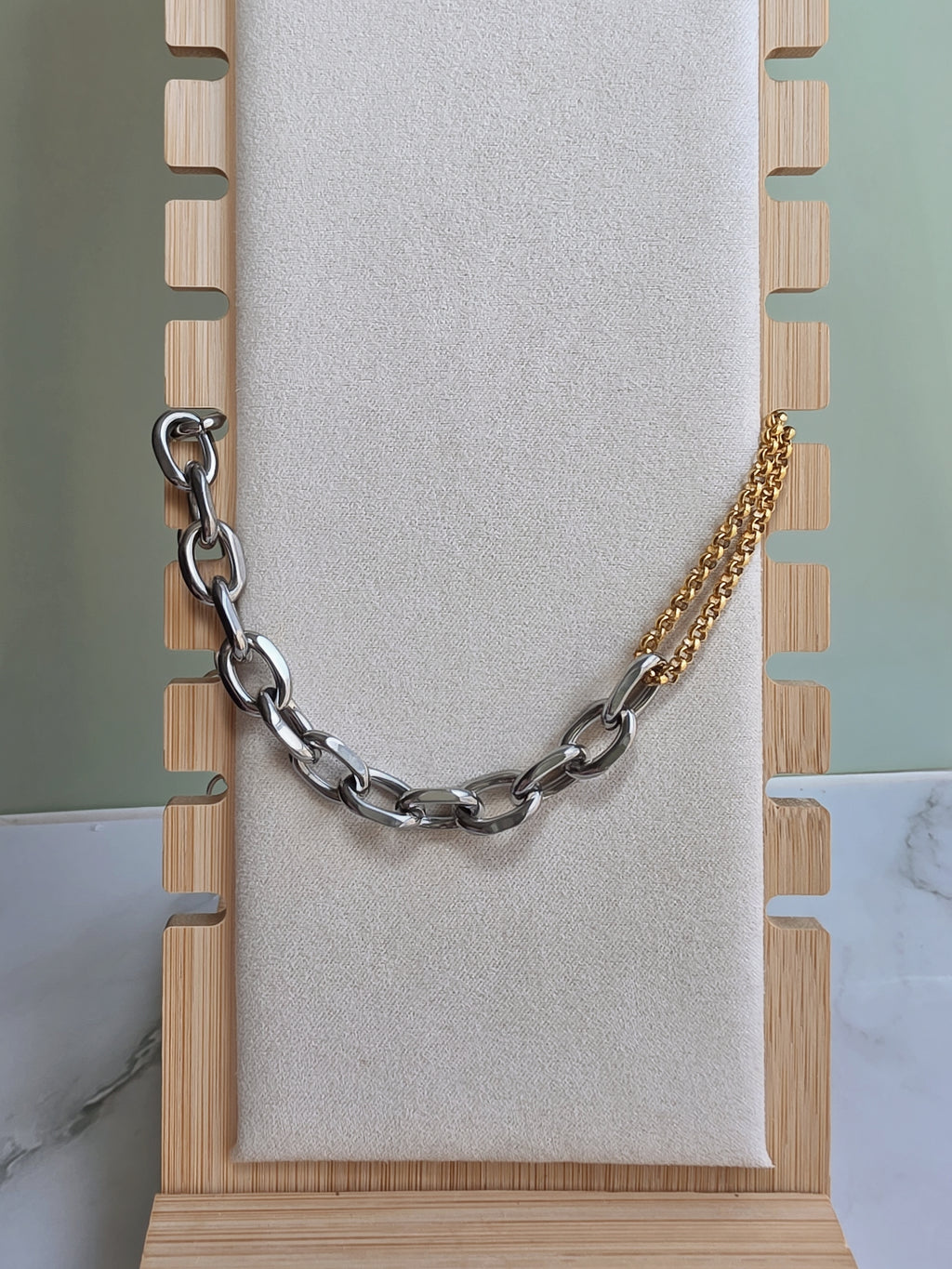 Modern mixed metal chain necklace for women.