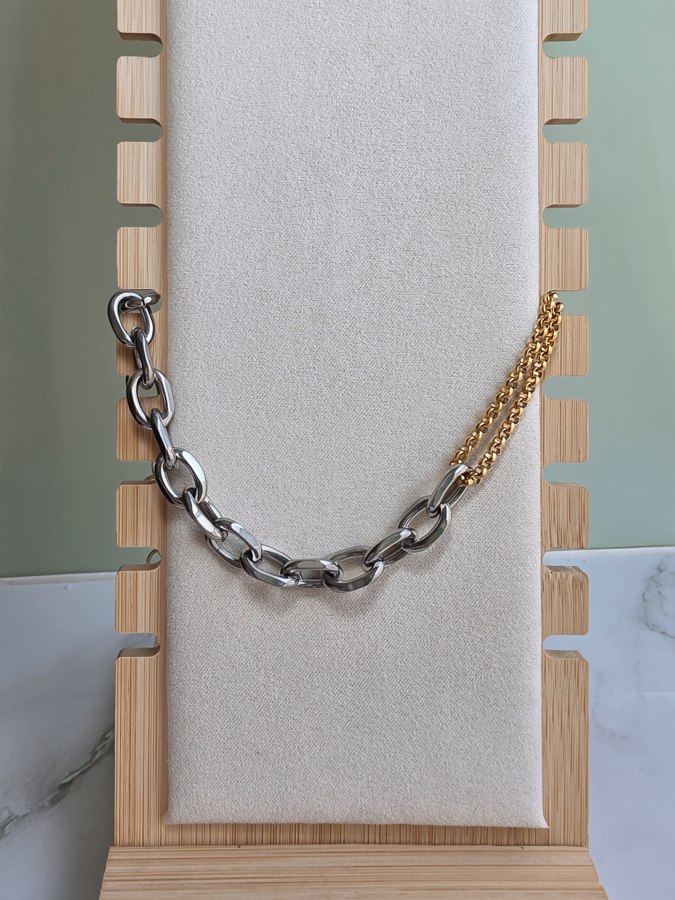 Modern mixed metal chain necklace for women.
