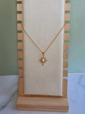 Non tarnish North Star necklace with a luminous opal centerpiece.