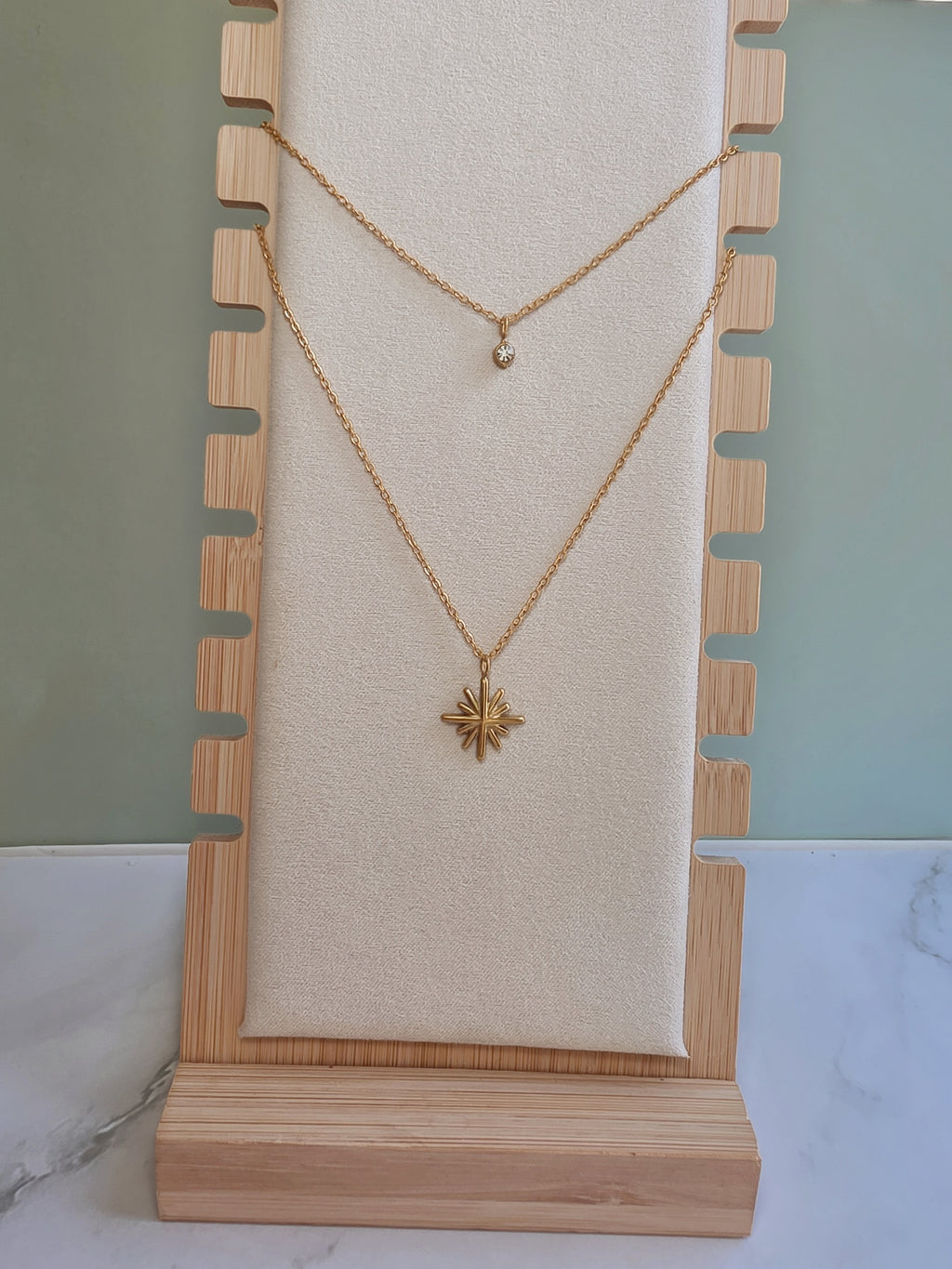 Dainty celestial necklace with a non tarnish finish.