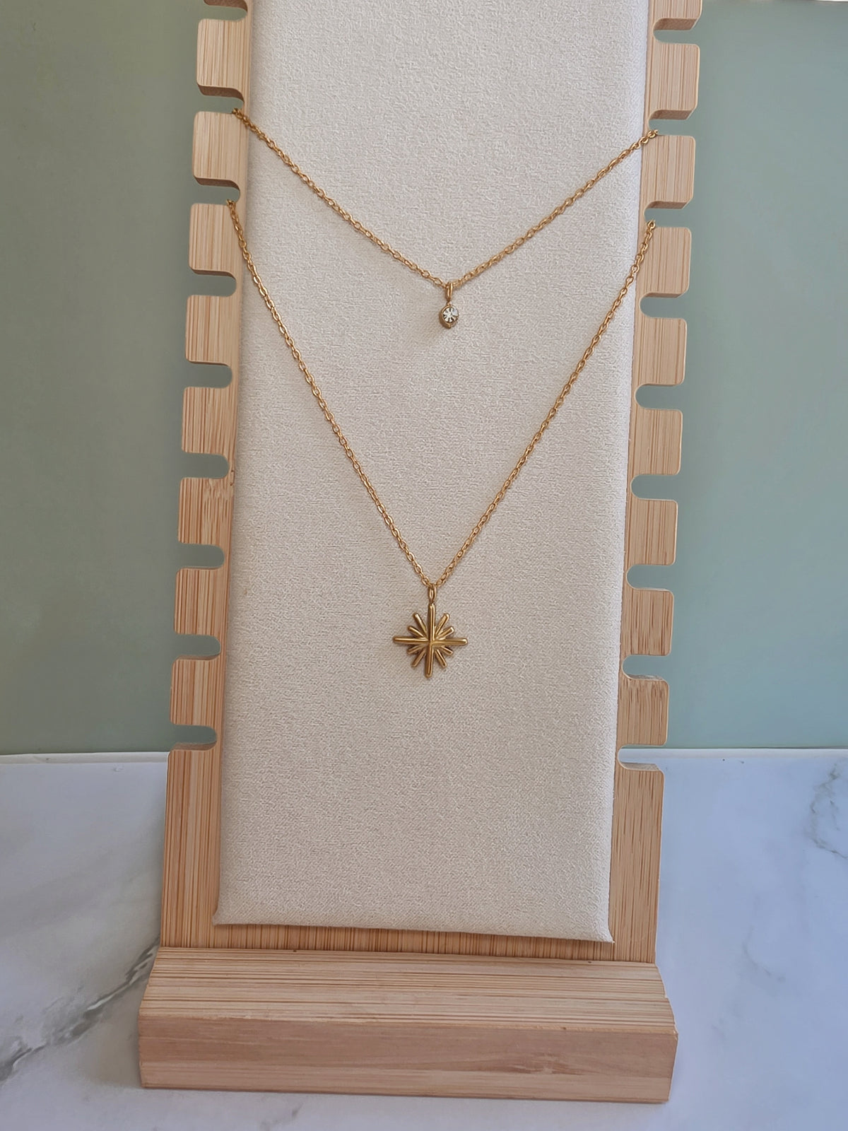 Dainty celestial necklace with a non tarnish finish.