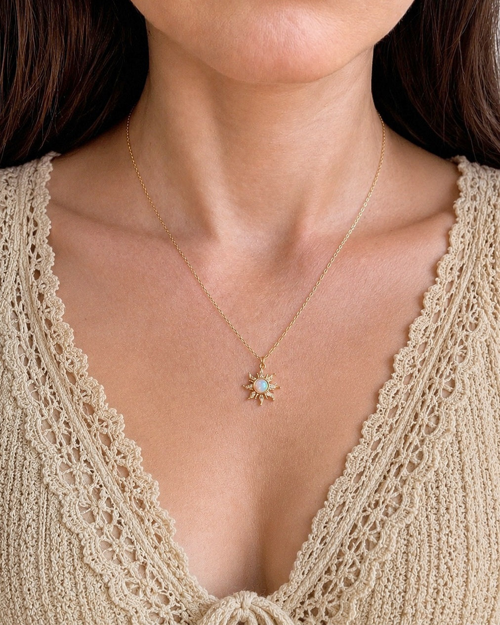 Opal Sun necklace with an 18K gold-plated celestial pendant.
