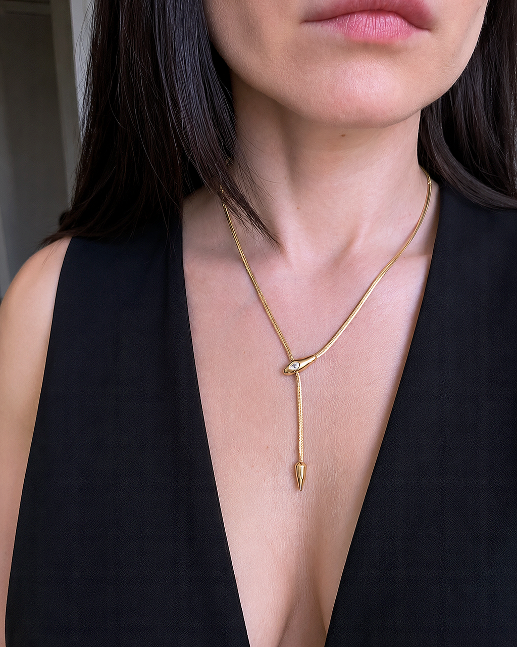 18K gold-plated herringbone snake chain necklace.