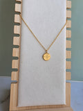 North Star compass necklace symbolizing guidance.
