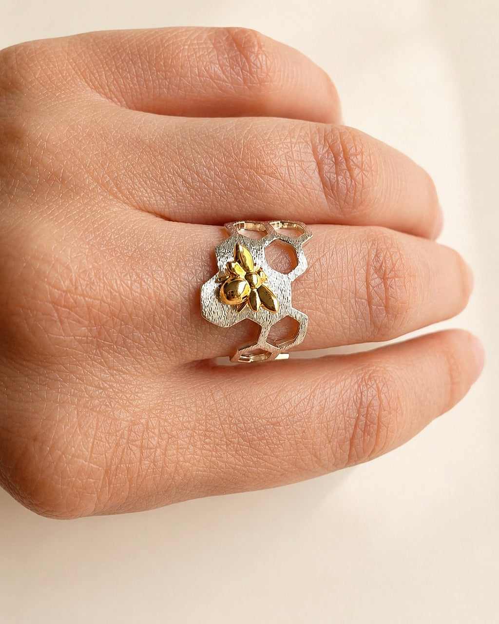 Honeycomb ring with 18K gold-plated bee.