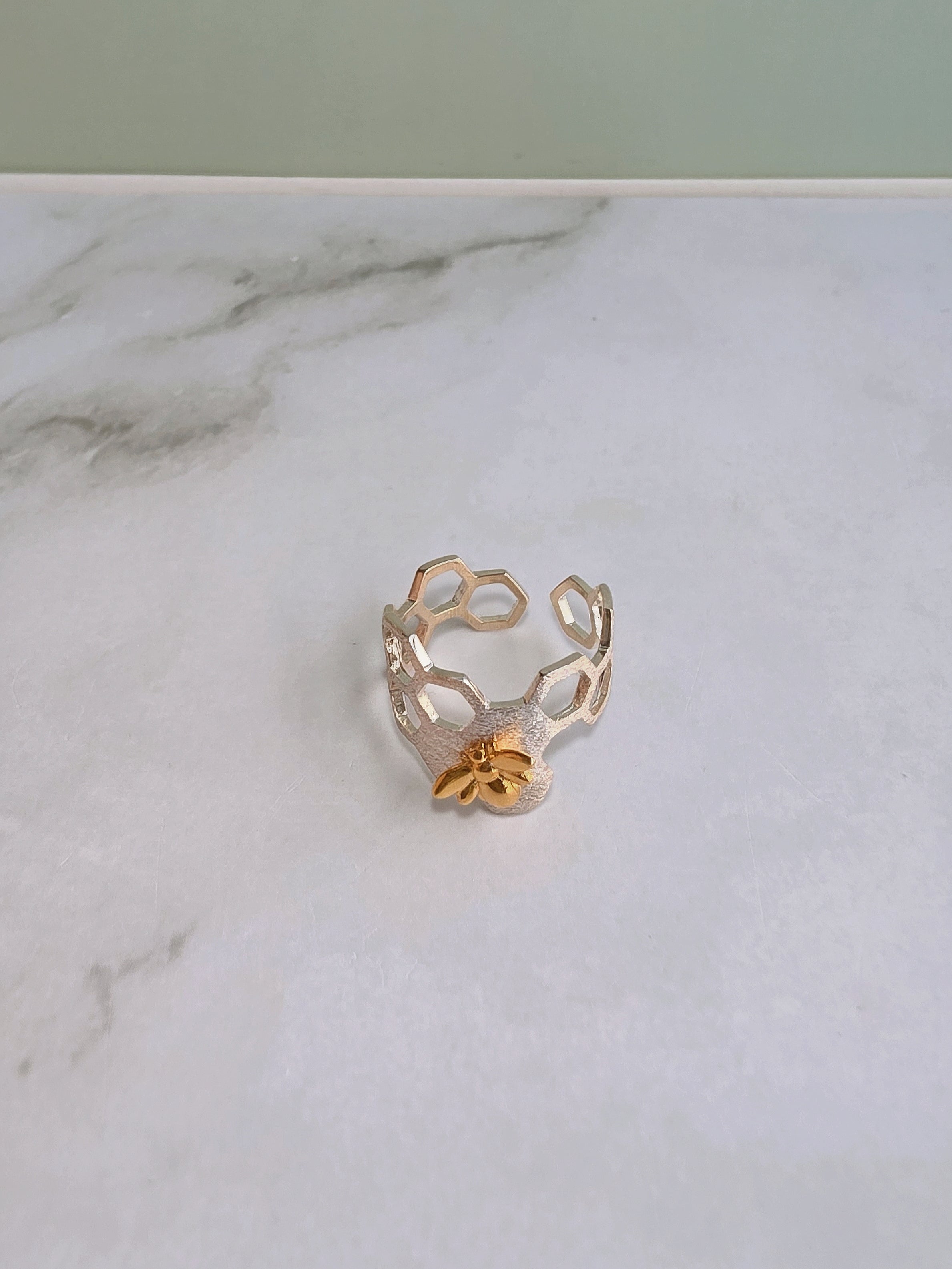 Chunky adjustable bee statement ring.