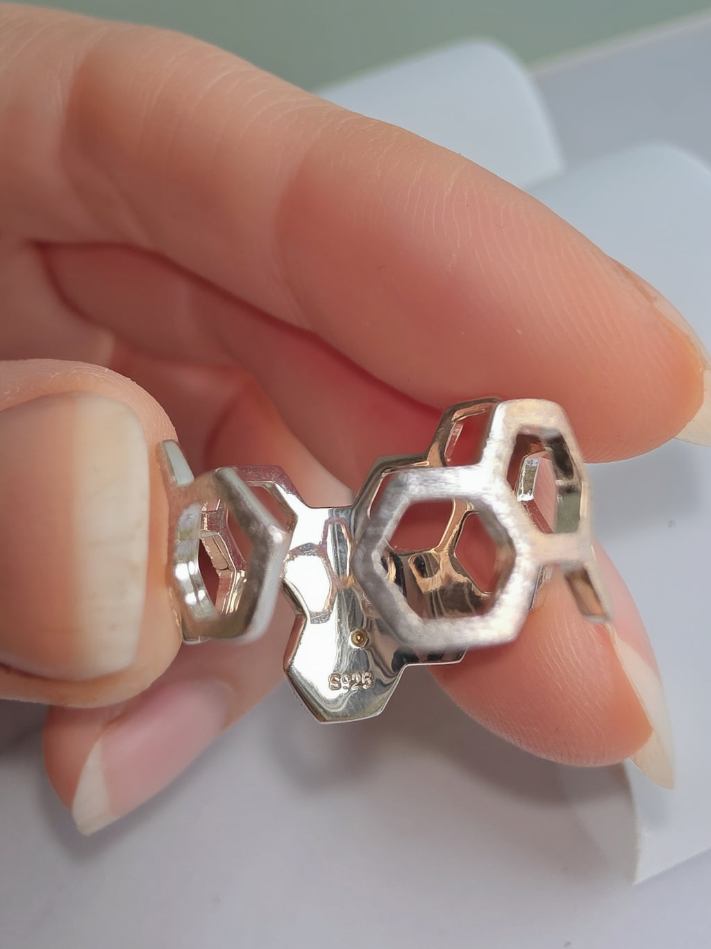 Nature-inspired sterling silver bee ring.