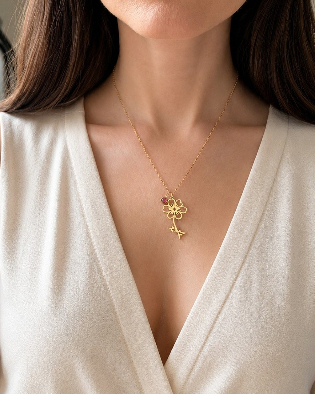 18K gold-plated birth flower necklace featuring an engraved floral pendant and birthstone.