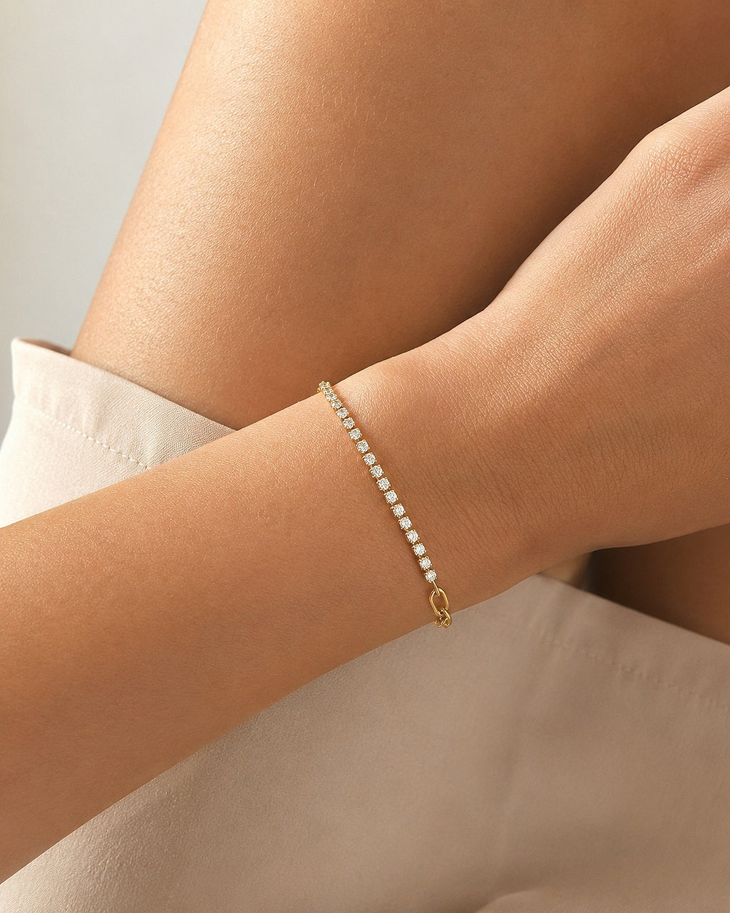 Minimalist paperclip chain bracelet with cubic zirconia.
