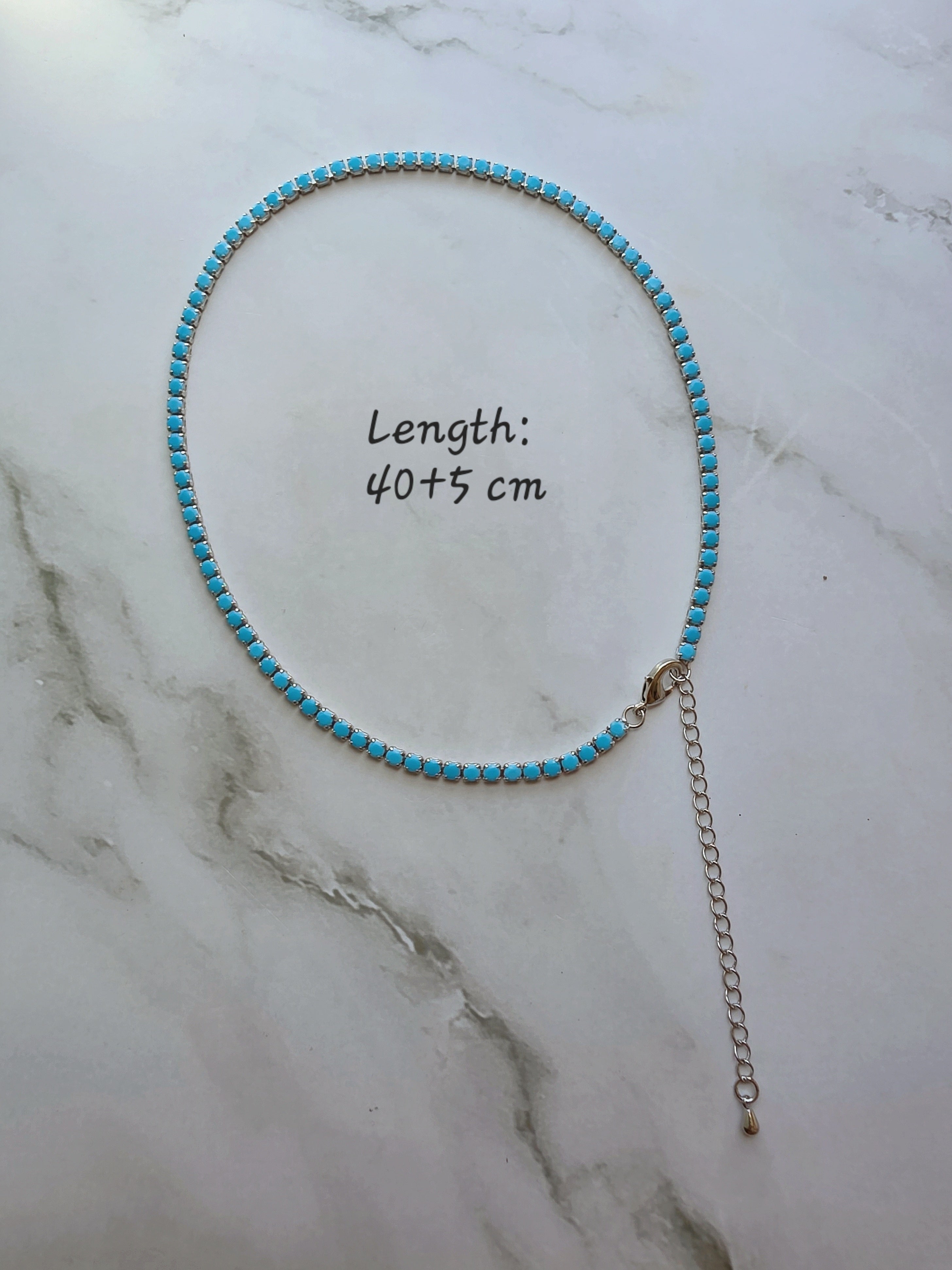 Gold stainless steel turquoise CZ choker.