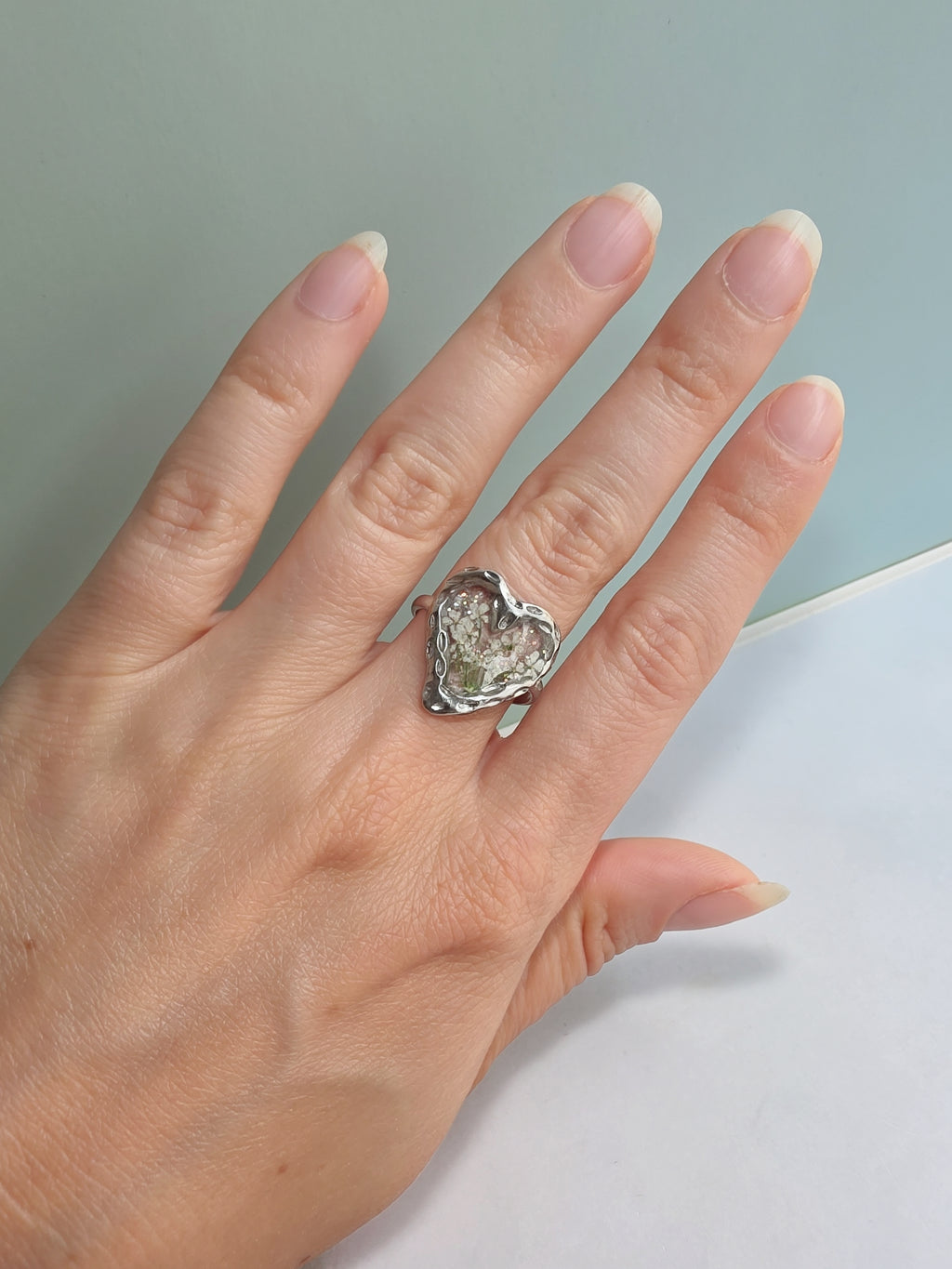 Floral resin jewelry featuring an elegant chunky heart design.