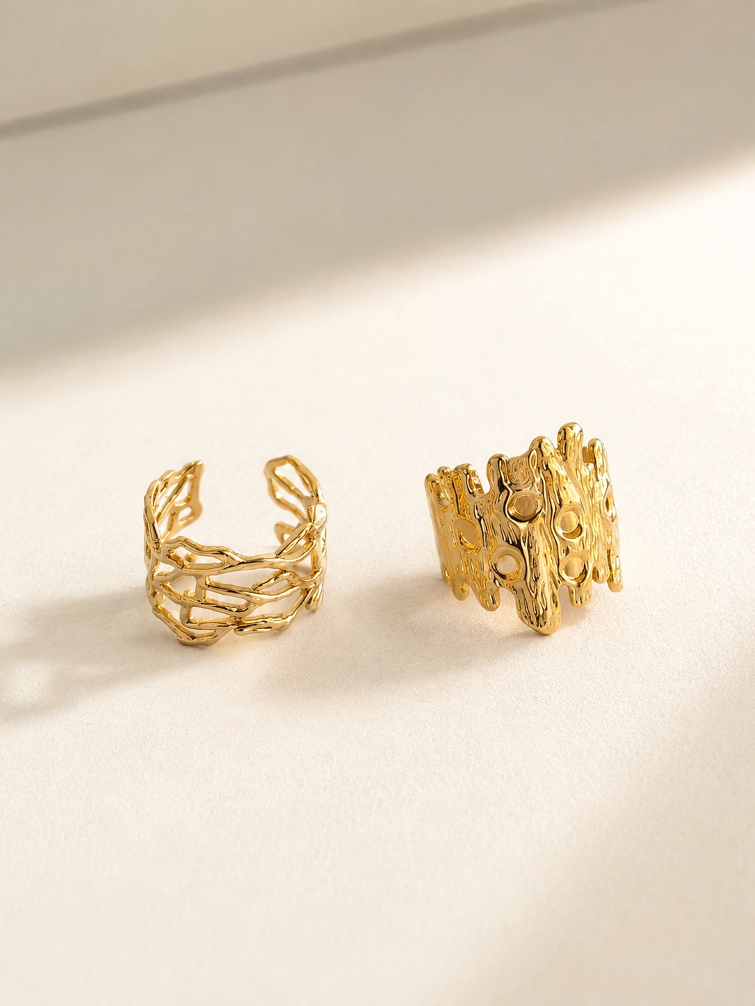 Organic molten statement ring featuring a polished 14K gold-plated finish.