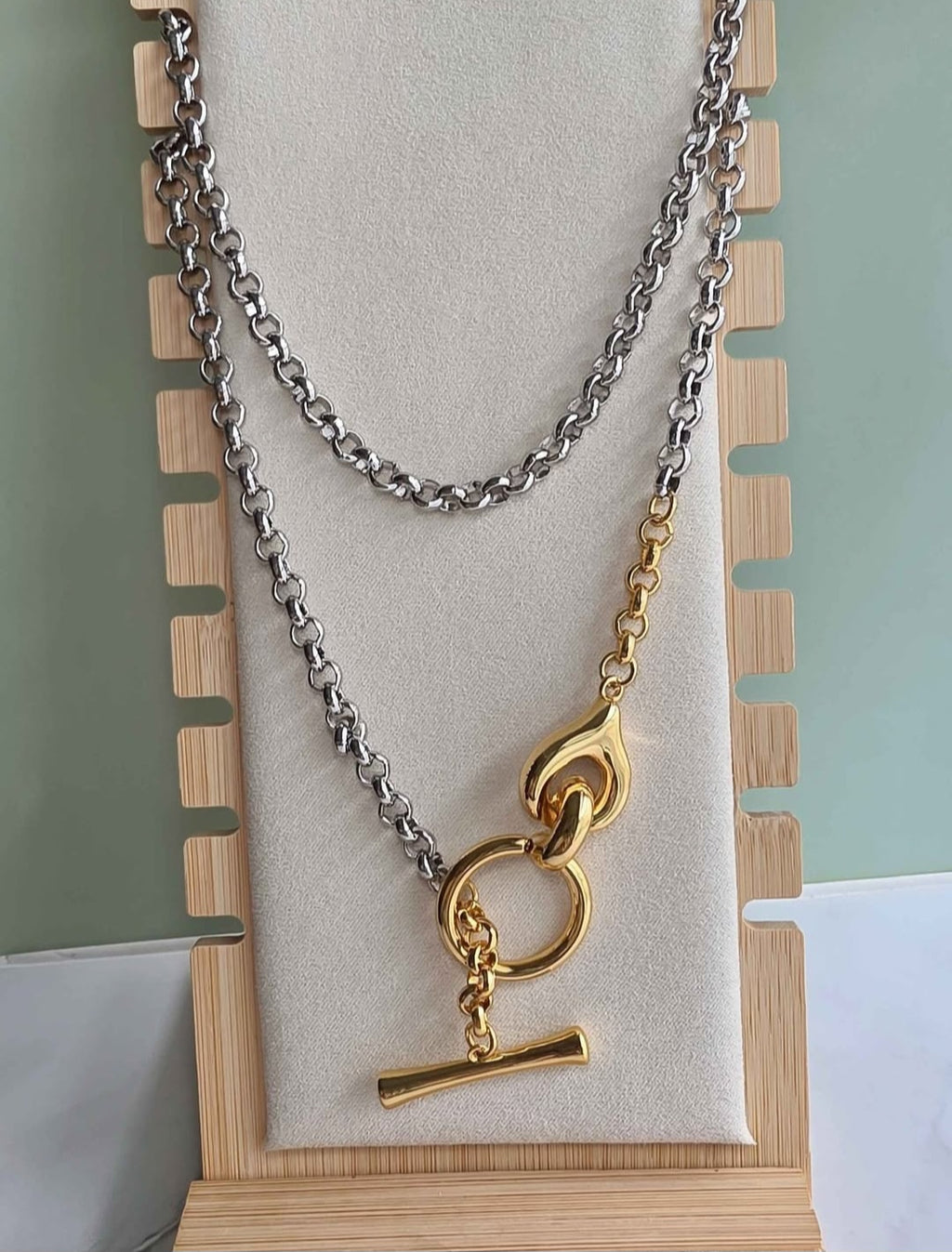 Modern mixed metal necklace perfect for layering with gold and silver jewelry.