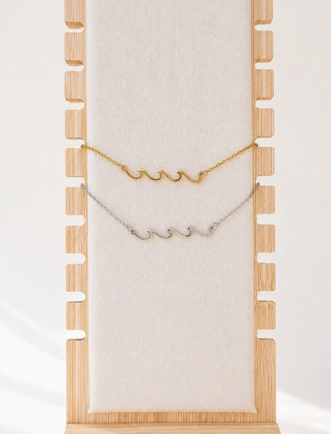 Minimal wave pendant necklace inspired by the sea.