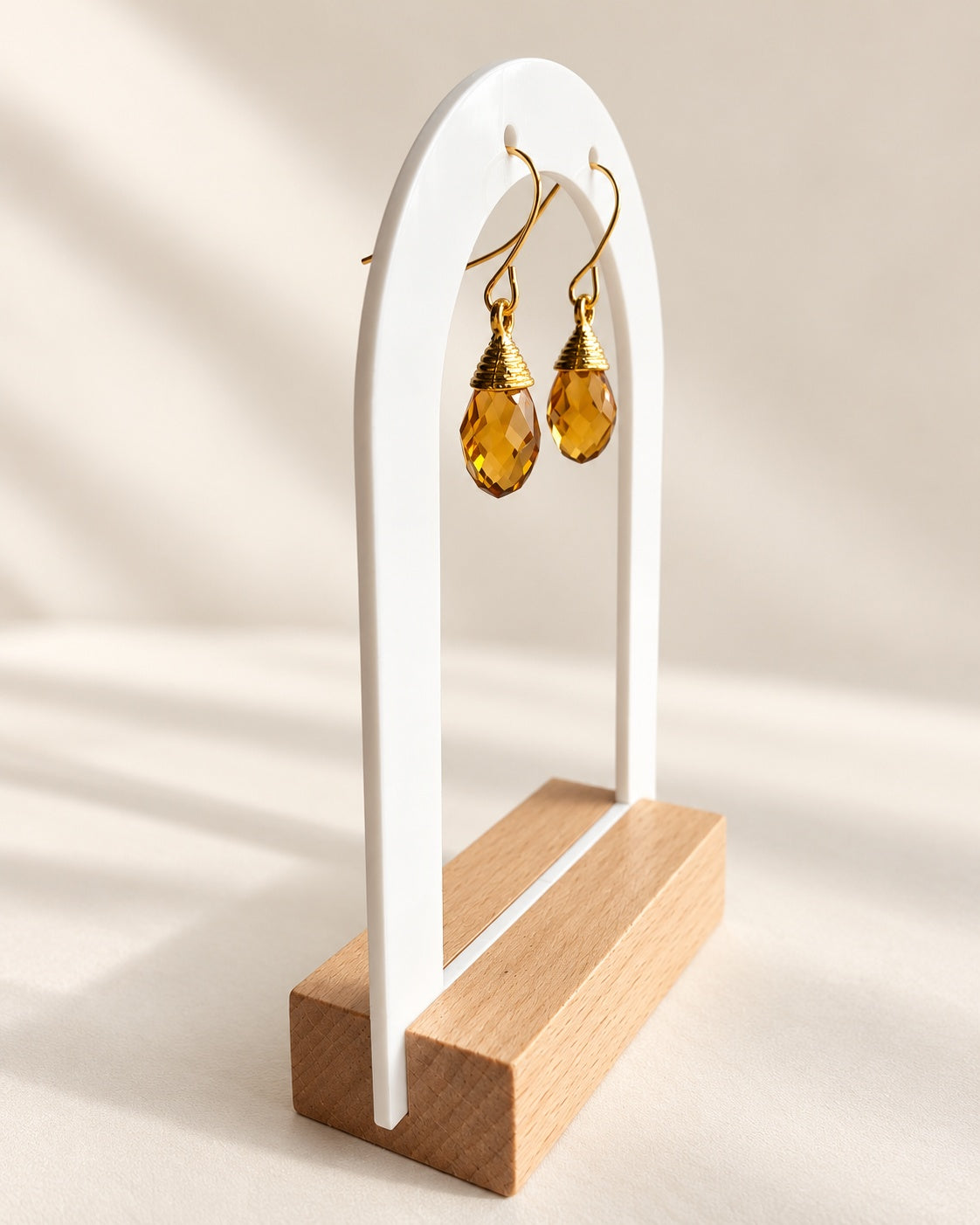 Elegant smoky quartz earrings with faceted teardrop stones