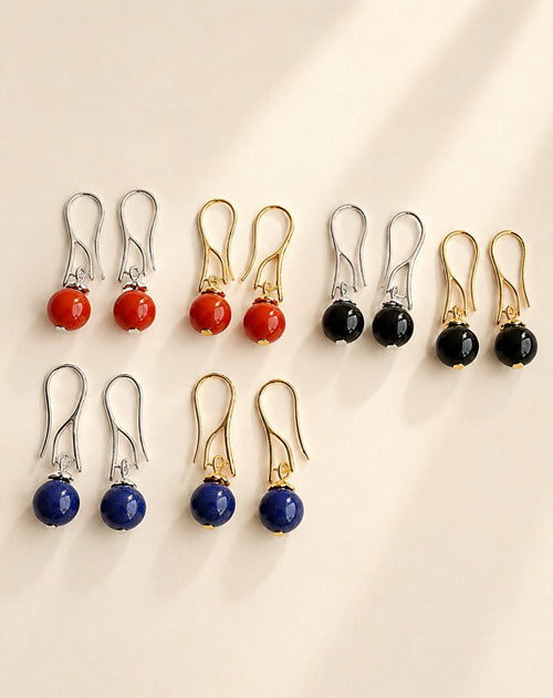 14K gold-plated gemstone drop earrings featuring black onyx, lapis lazuli, and red agate.
