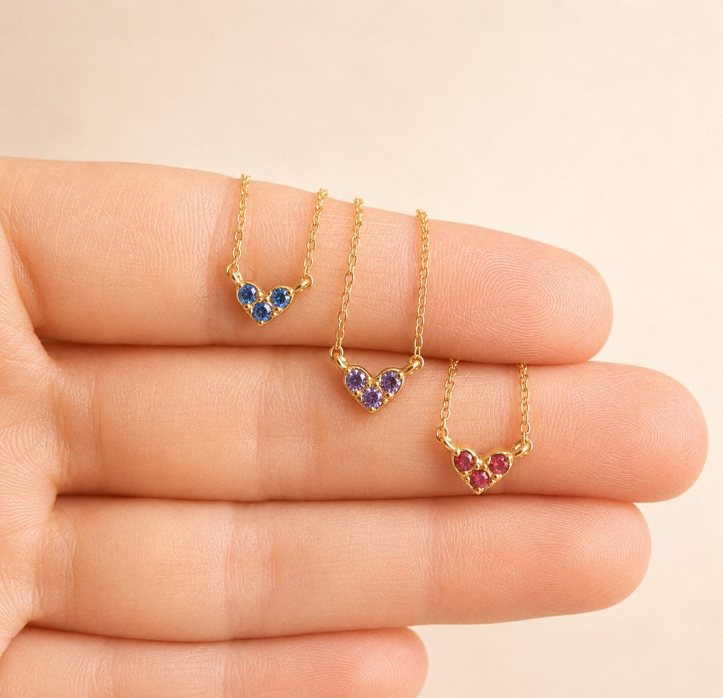 Heart birthstone necklace crafted from 925 sterling silver with 18K gold plating.