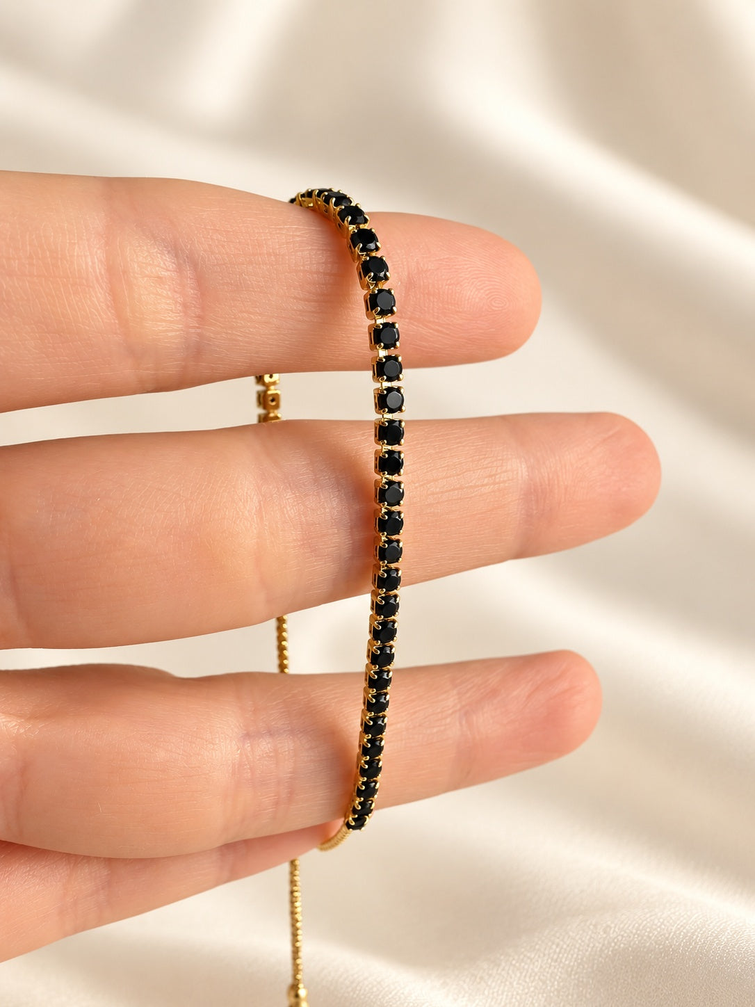 Womens black gemstone bracelet with adjustable slider closure