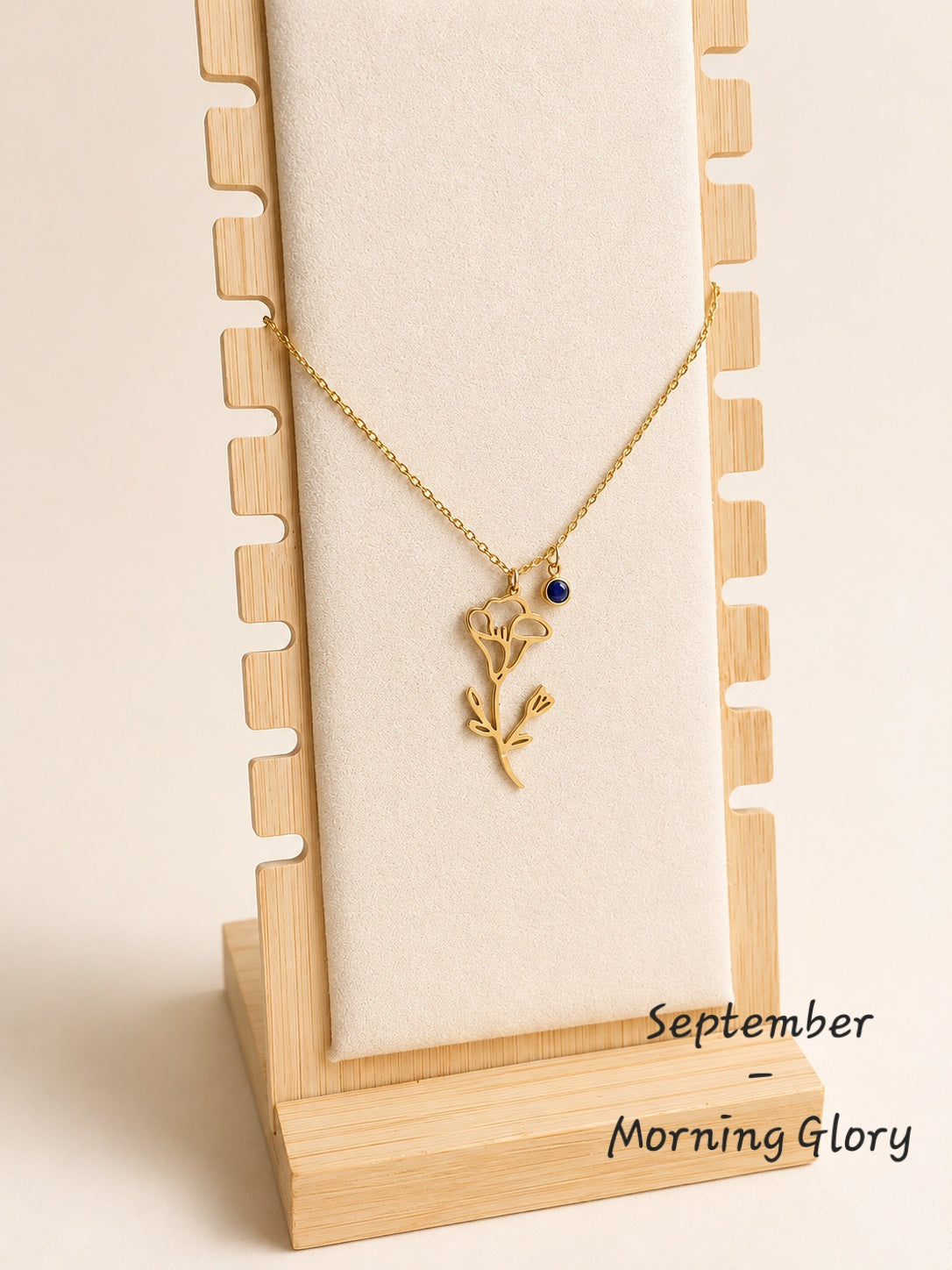 Waterproof birth flower necklace with matching birthstone in 18K gold-plated stainless steel.
