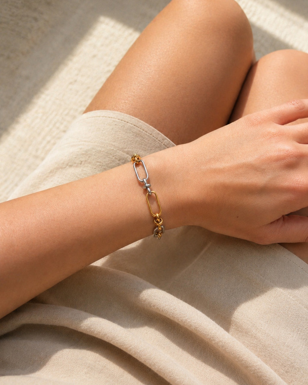 Stainless steel bracelet with 18K gold plated accents.