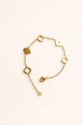 Gold Clover Bracelet with an 18K gold-plated finish and adjustable chain.