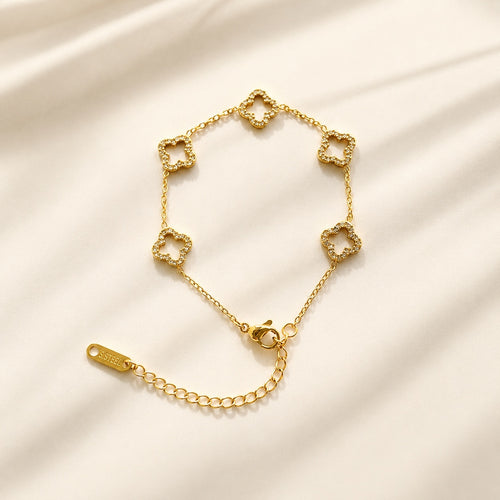 4 leaf clover bracelet with an 18K gold-plated non-tarnish finish.