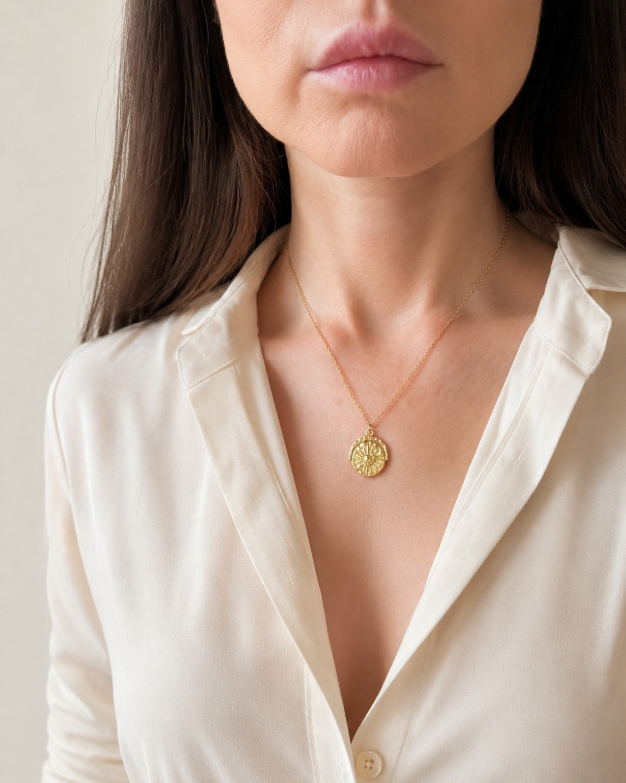 18K gold-plated necklace featuring a rotating sun and moon pendant.