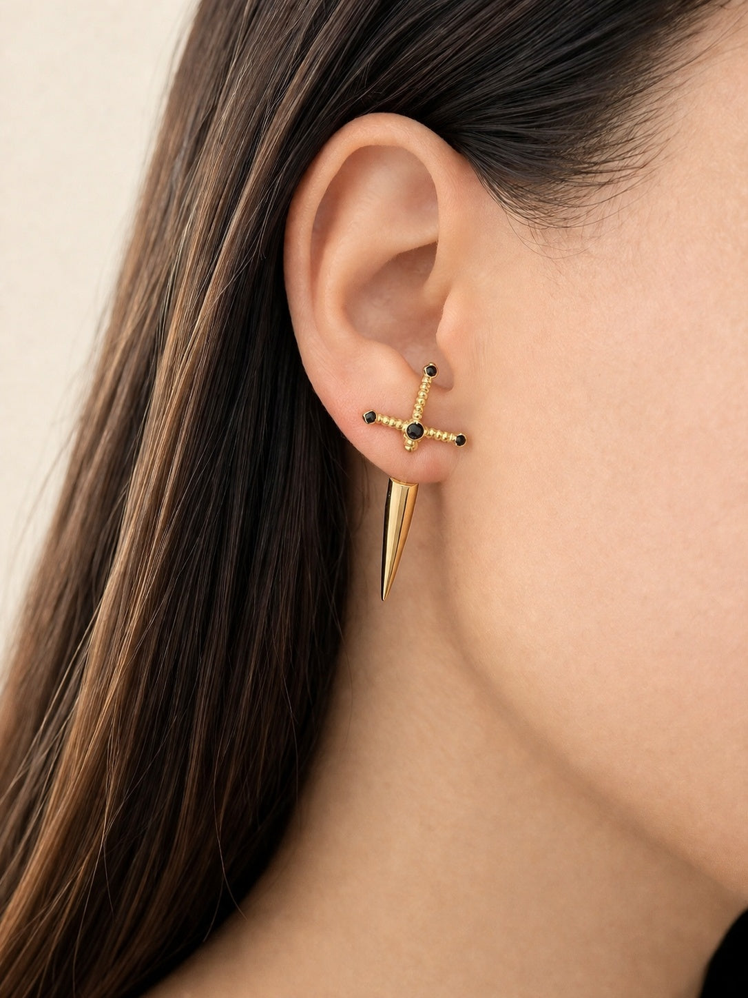 Sword dagger stud earrings crafted from 925 sterling silver with 18K gold plating.