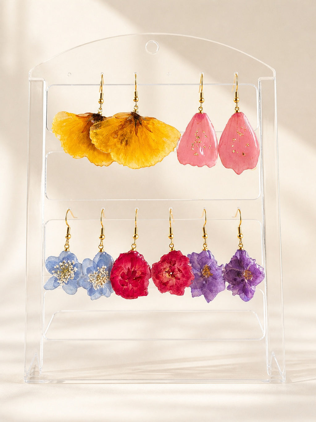 Real pressed flower earrings with genuine preserved flowers and 14K gold-plated hooks.