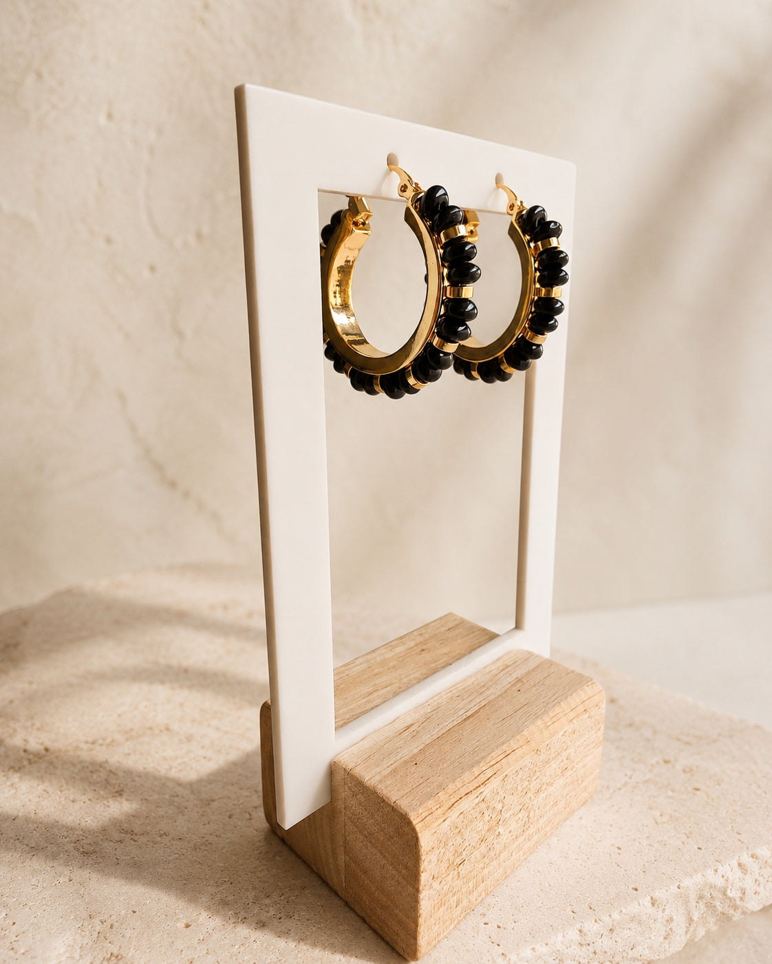 Gold and black gemstone statement hoop earrings