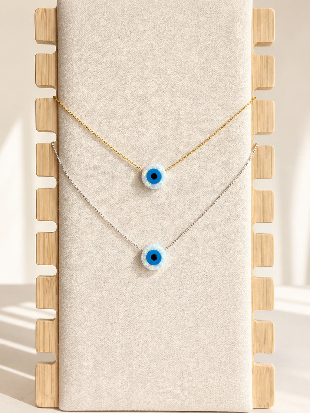 Necklace with evil eye featuring a lab-created opal pendant on a 925 sterling silver chain.