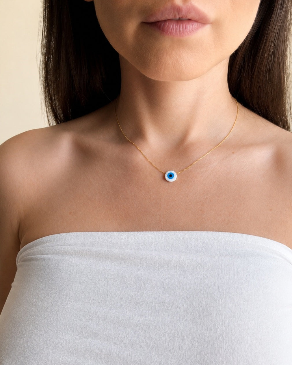 925 sterling silver evil eye necklace with a shimmering lab-created opal.