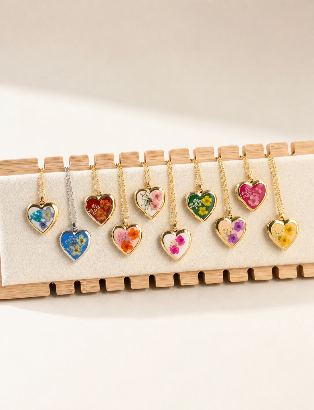 Heart locket necklace with genuine pressed flowers and an 18K gold-plated finish.