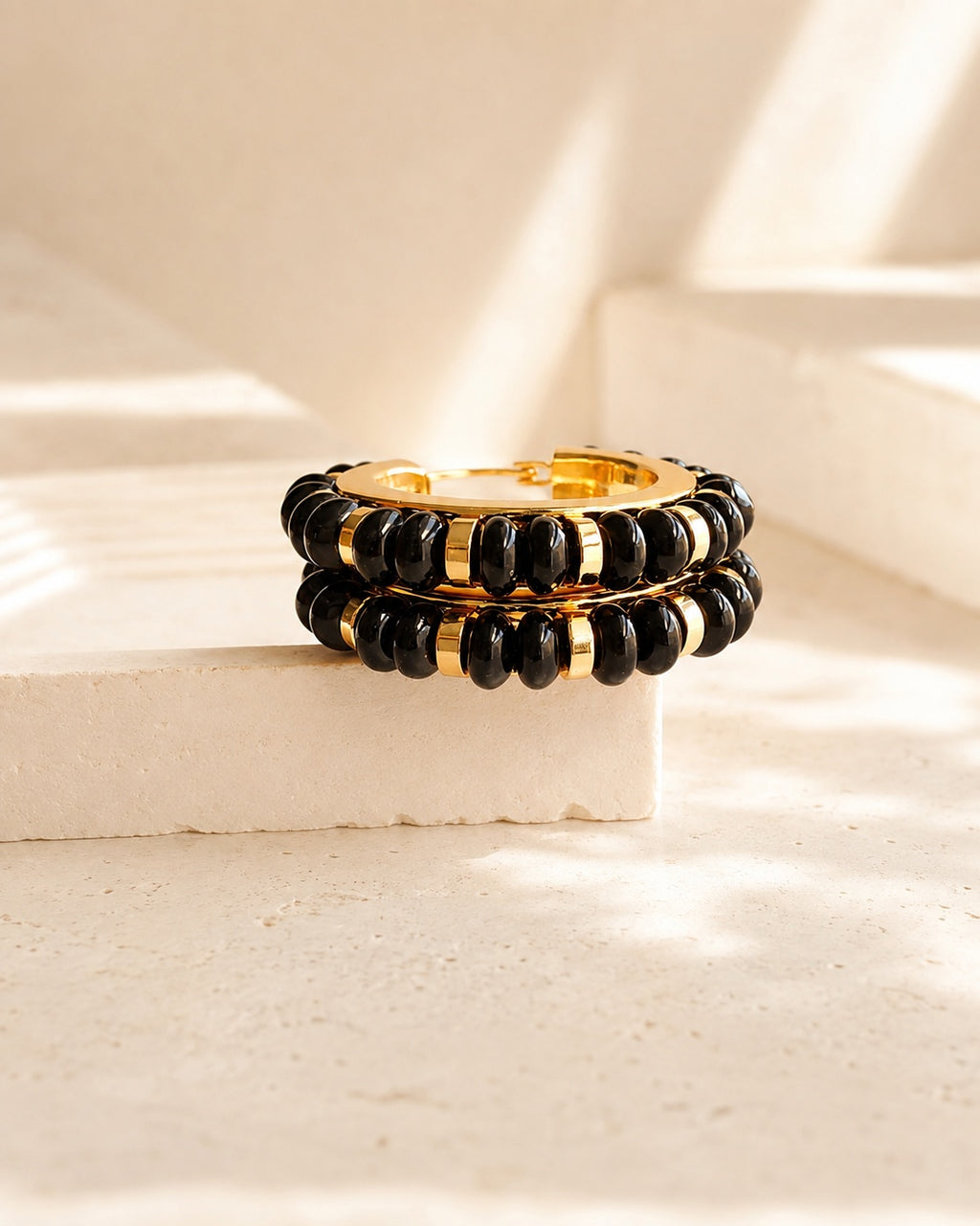 Luxury black and gold hoop earrings for women