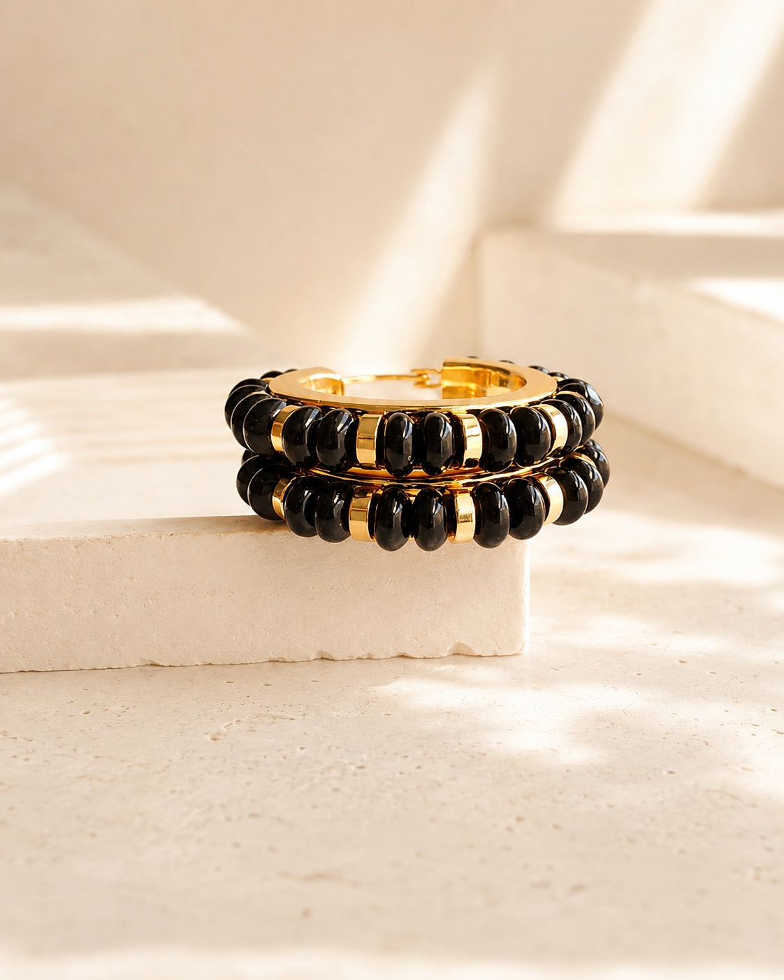 Luxury black and gold hoop earrings for women