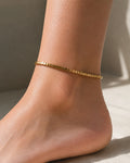 Elegant gold beaded ankle bracelet for women with a minimalist design.