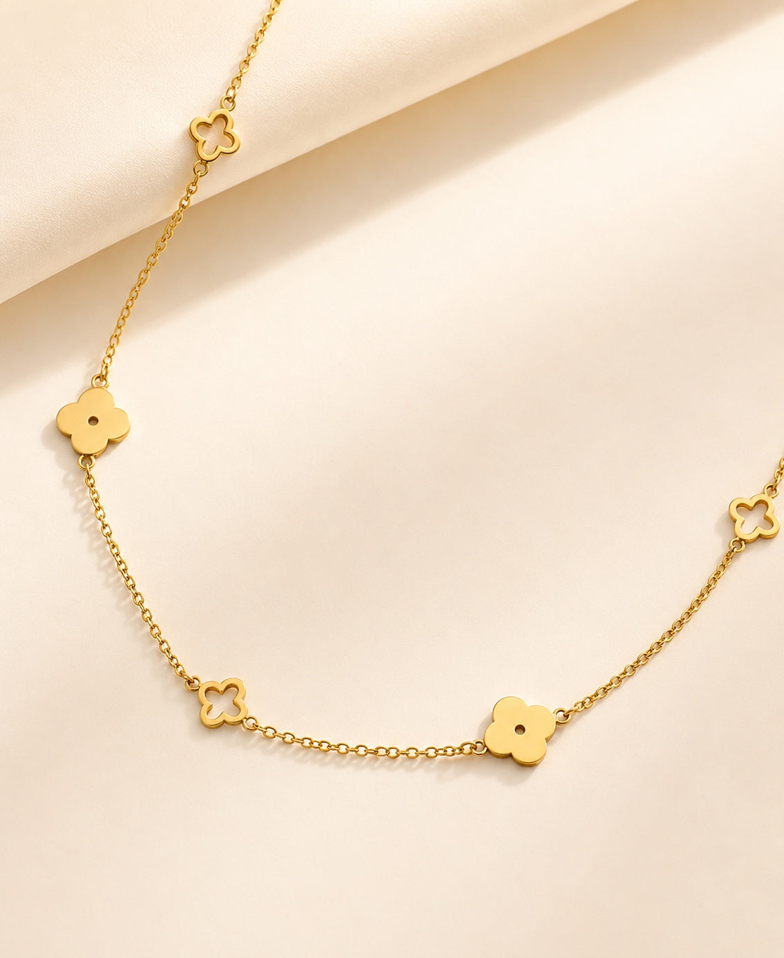 Non-tarnish gold clover necklace perfect for everyday wear and layering.