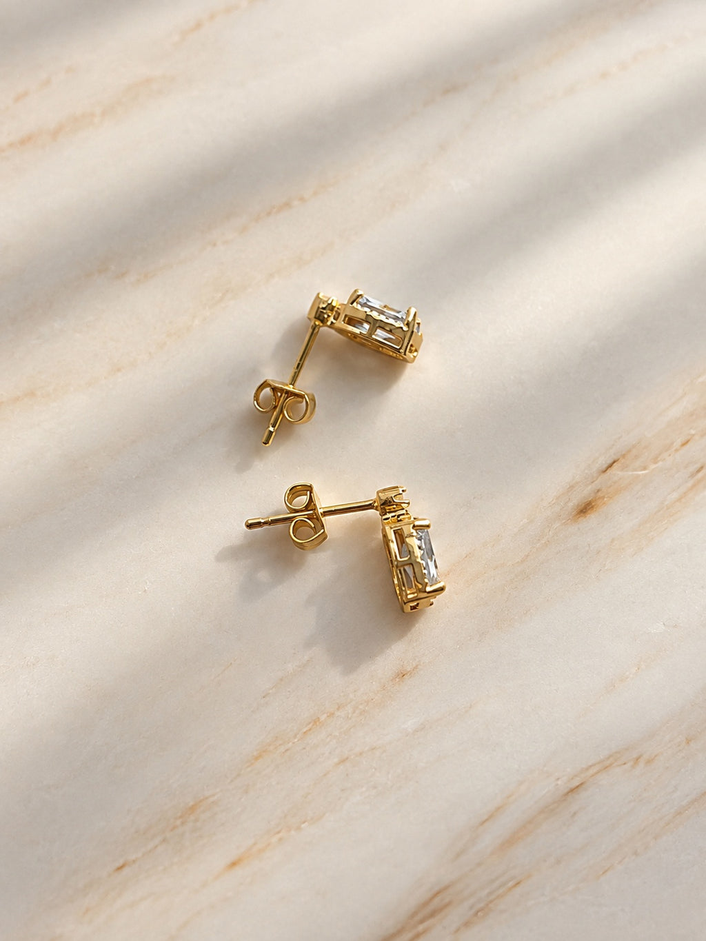 Oval blue aquamarine gemstone earrings in gold-plated silver