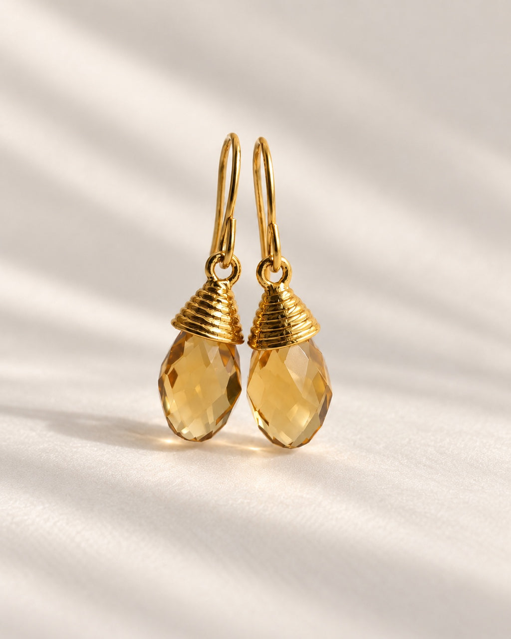 Faceted smoky quartz dangle earrings in warm brown tones