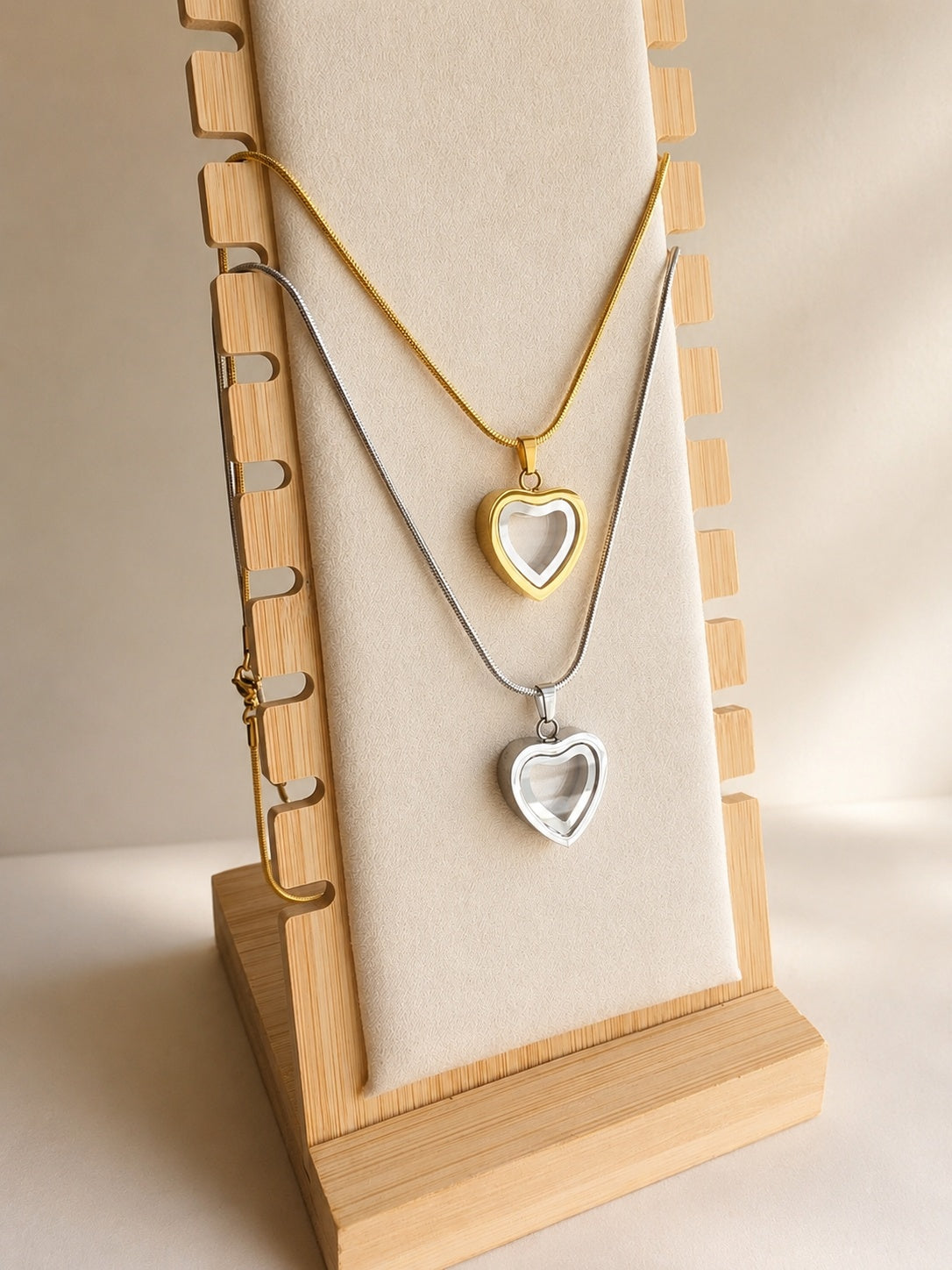Memorial keepsake heart necklace in gold and silver.