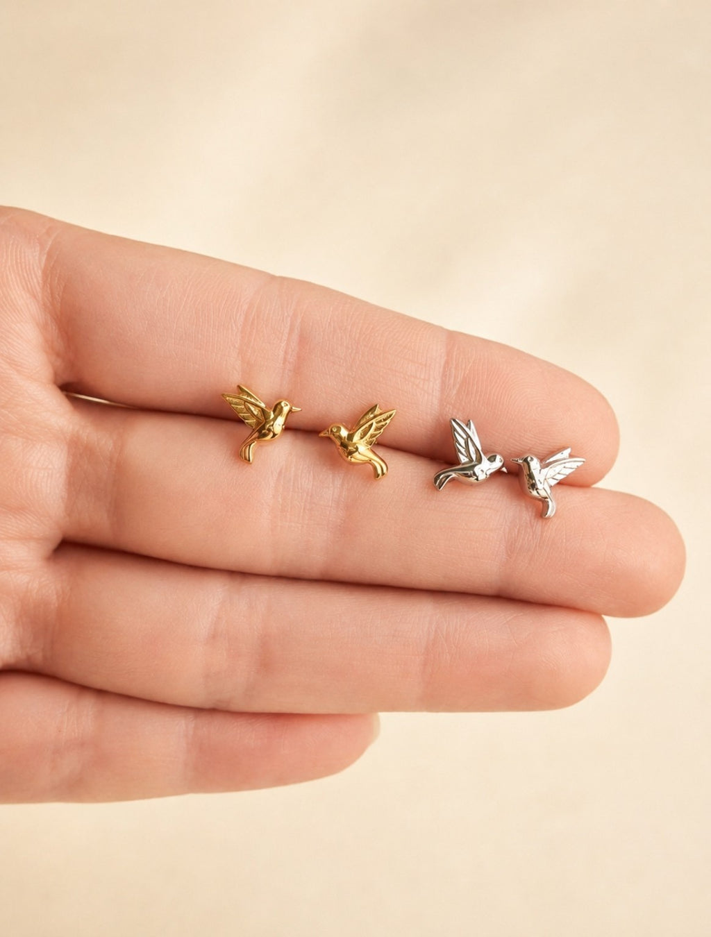Hummingbird earrings crafted from 925 sterling silver with an 18K gold-plated finish.