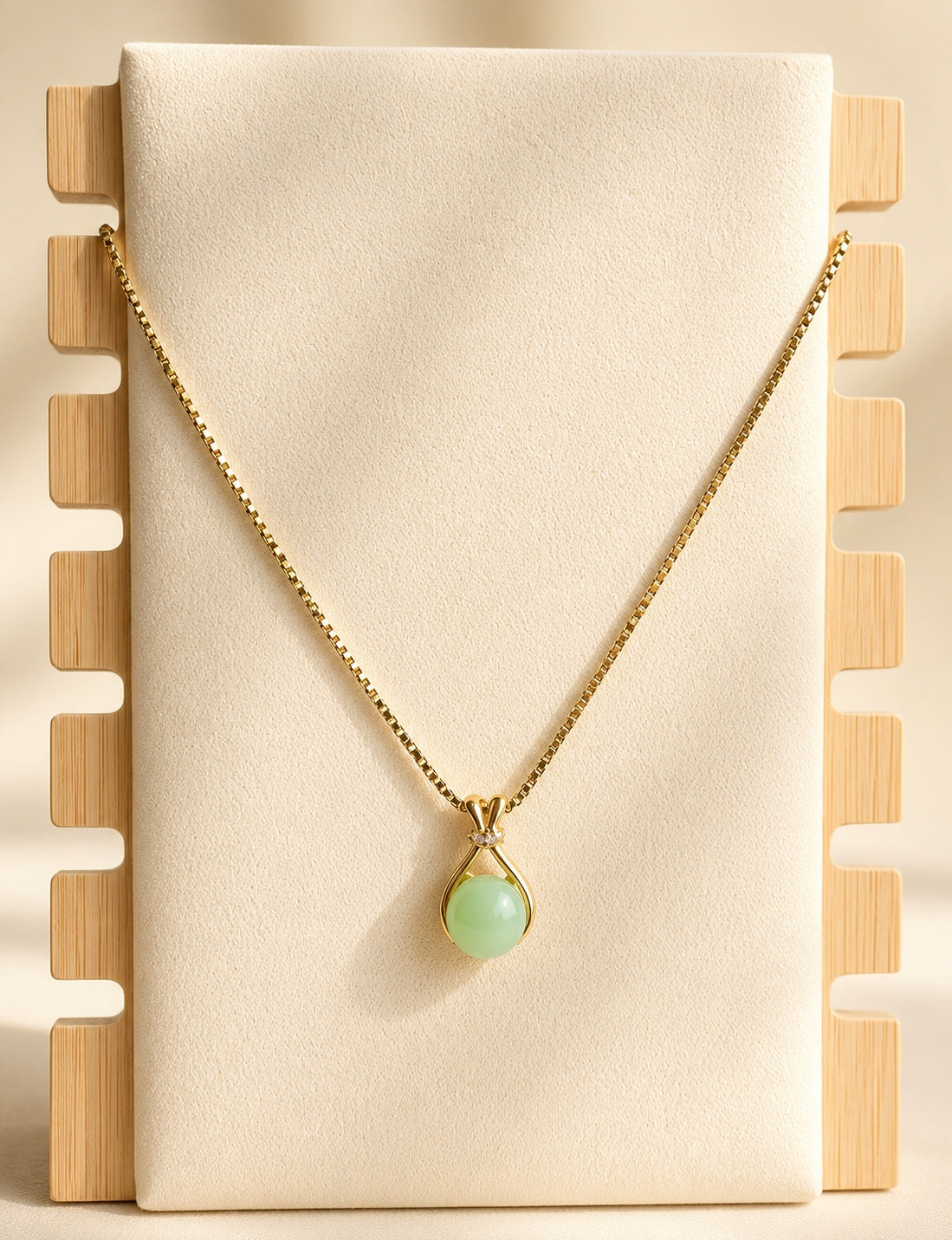 Minimalist green jade gemstone necklace with a timeless design.