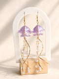 Jellyfish dangle earrings with a polished 14K gold-plated finish.